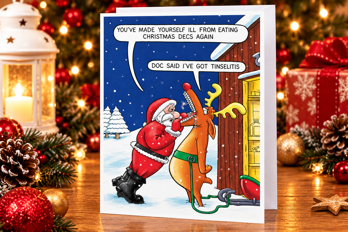 Paperlink funny Christmas card displayed with Christmas decorations