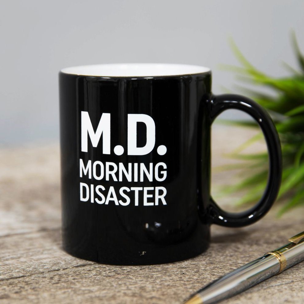 This MD - Morning Disaster Mug is a Greeting Card priced at £ 10.99 from Made To Be Treasured range. Produced by Harvey Makin for excellent quality