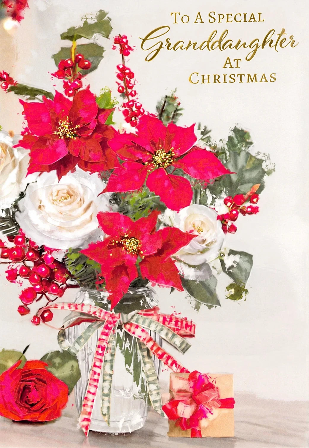 Front of a granddaughter Christmas card with red poinsettias, white roses, berries and gold foil lettering.
