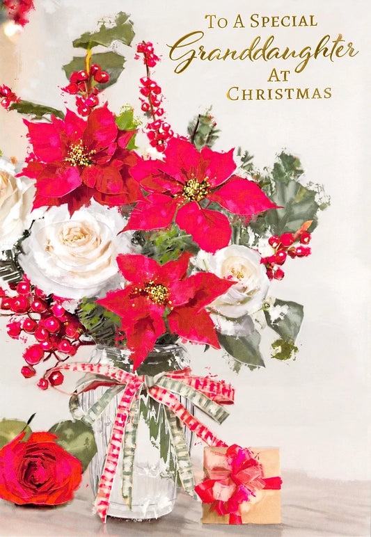 Front of a granddaughter Christmas card with red poinsettias, white roses, berries and gold foil lettering.