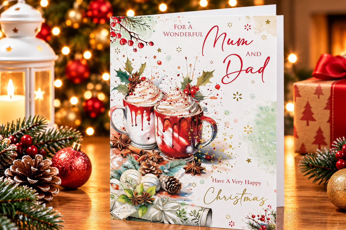 Mum and Dad Christmas greeting card displayed in a cosy festive setting
