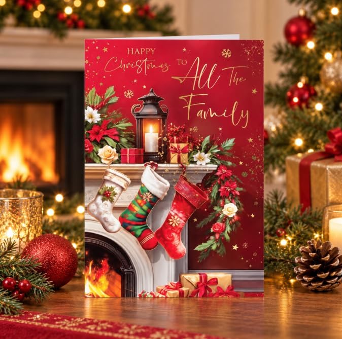 Kingfisher family Christmas card displayed beside a festive fireplace