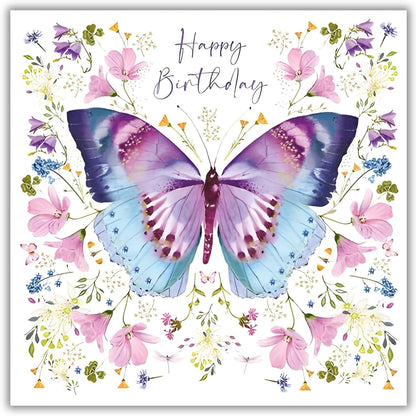 Front of Nigel Quiney Happy Birthday greeting card with purple and blue butterfly and pastel flowers