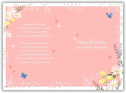 Great granddaughter birthday card interior showing heartfelt message about brightening life with daisy and butterfly border design on pink background
