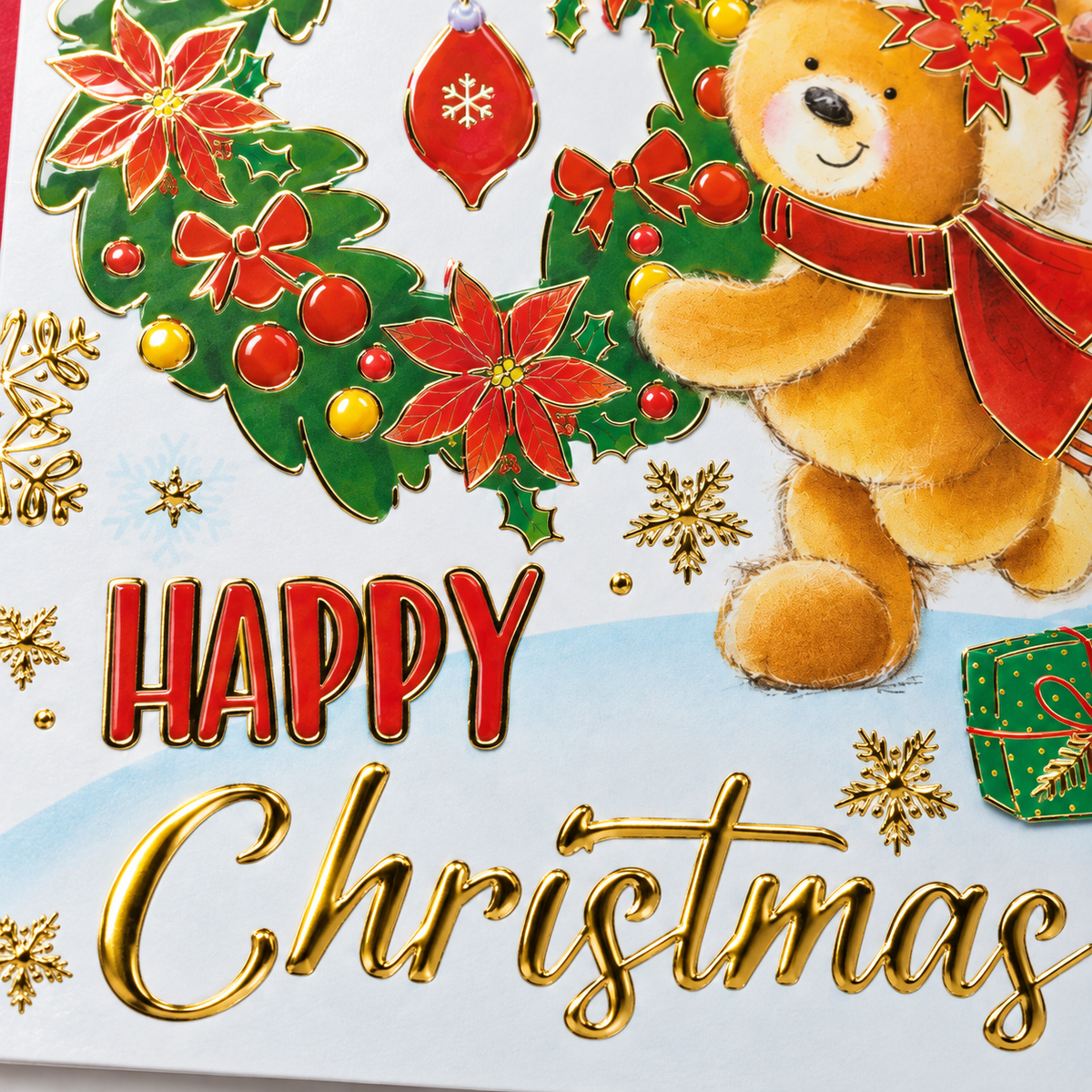 Mummy teddy bear Christmas card displayed in a festive setting