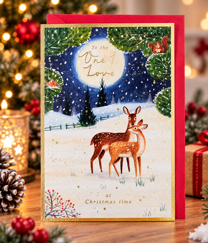 Romantic One I Love Christmas card with two deer displayed in a festive lifestyle setting