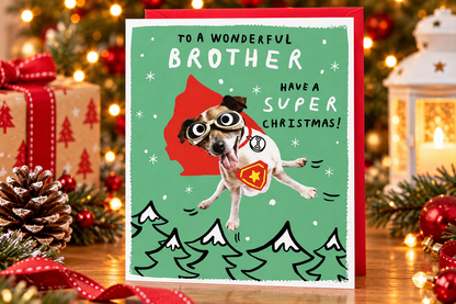 Paperlink brother superhero dog Christmas card displayed in a festive setting