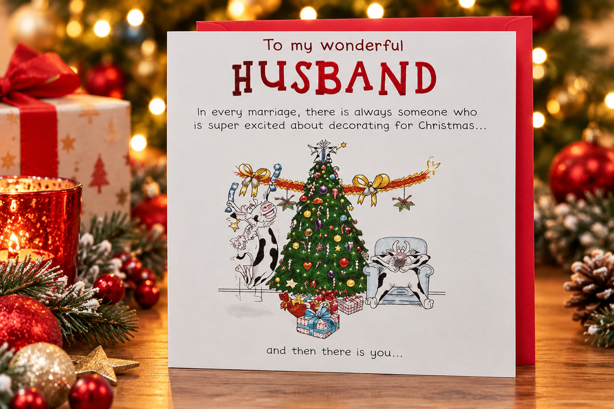 Paperlink husband Christmas card on a festive table with red envelope