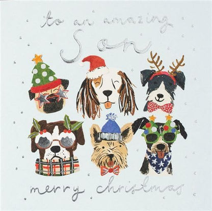Front of Nigel Quiney Christmas card for son with six festive dogs and silver Merry Christmas lettering