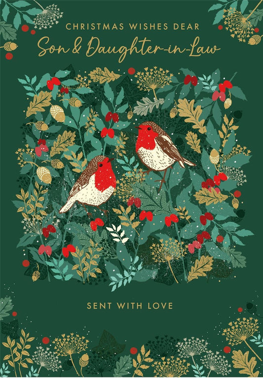 Front of Nigel Quiney Son and Daughter-in-Law Christmas card with two robins on dark green foliage