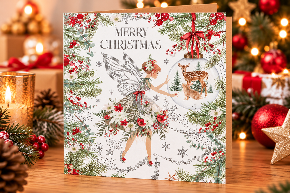 Nigel Quiney Christmas fairy card on a festive table