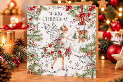 Nigel Quiney Christmas fairy card on a festive table