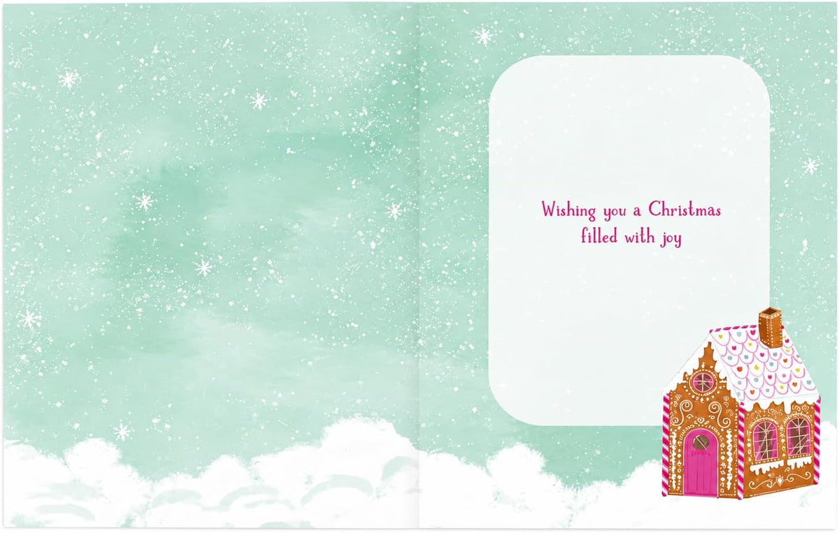 Inside of Great Granddaughter Christmas card with gingerbread house illustration and message Wishing you a Christmas filled with joy