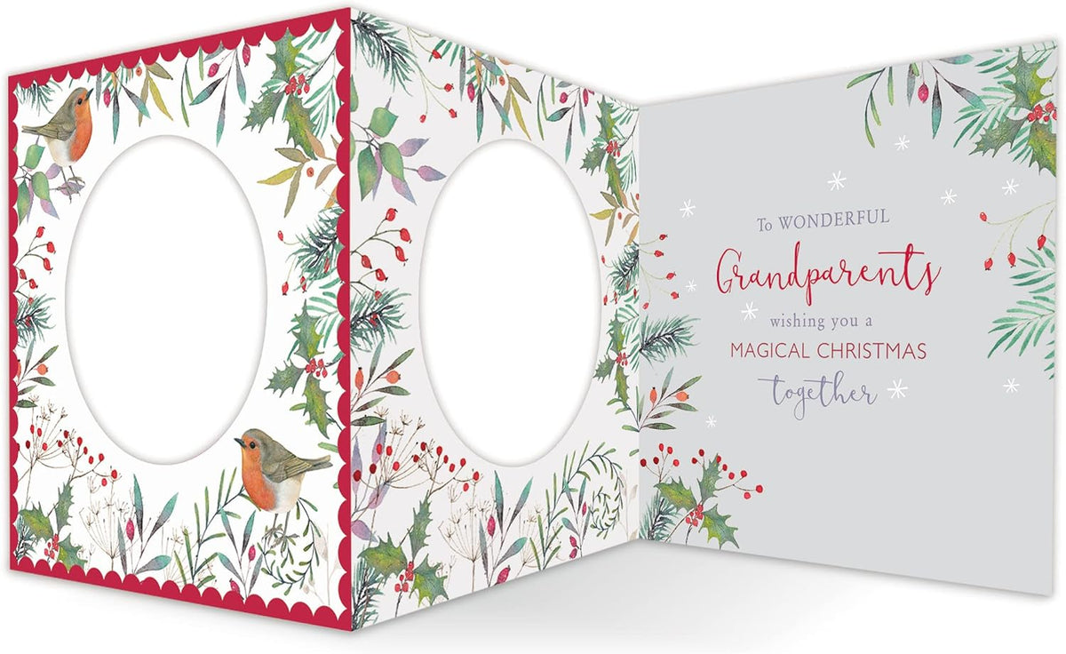 Opened Grandparents Christmas card showing robin and holly artwork with printed Christmas message inside