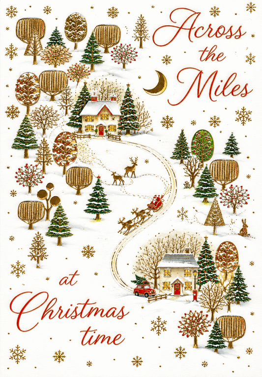 Abacus Across the Miles Christmas card with snowy village scene and gold detailing, 151 x 228mm