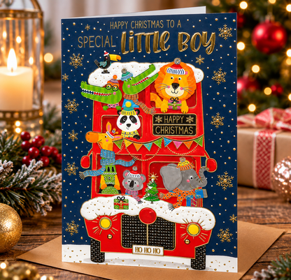 Abacus Special Little Boy Christmas card displayed in a warm festive setting