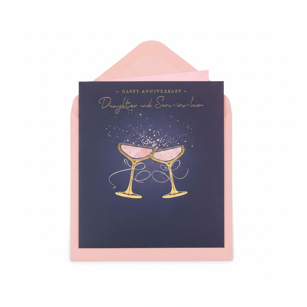 Made To Be Treasured anniversary card for daughter and son-in-law with gold foil champagne glasses on navy blue.