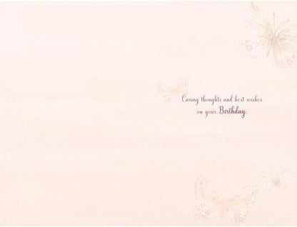 Made To Be Treasured birthday card with pastel butterflies and "Caring thoughts and best wishes on your Birthday" text.