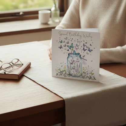Made To Be Treasured 'Happy Birthday' card with butterfly jar illustration and silver foil finish. Eco-friendly card.