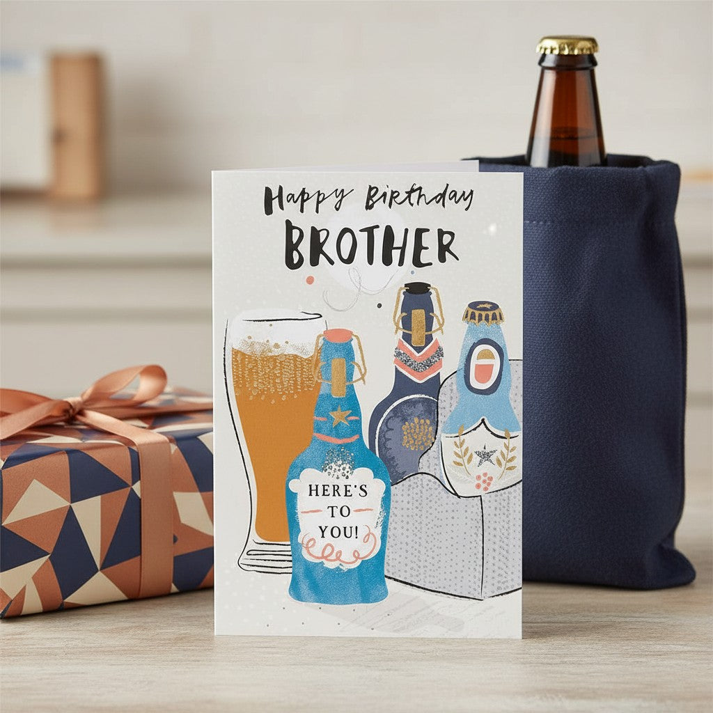 Made To Be Treasured Happy Birthday Brother card with beer bottles and a pint glass, featuring gold foil accents.