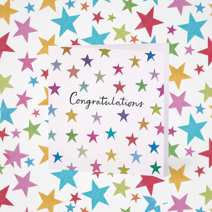Made To Be Treasured colourful star congratulations card with 'Congratulations' text. Blank inside.