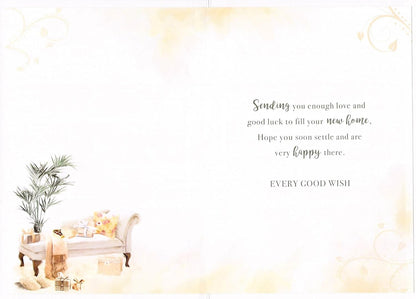 Made To Be Treasured luxury housewarming card with silver foil, featuring a chaise lounge with gifts and a plant. Inside message wishes good luck for a new home.