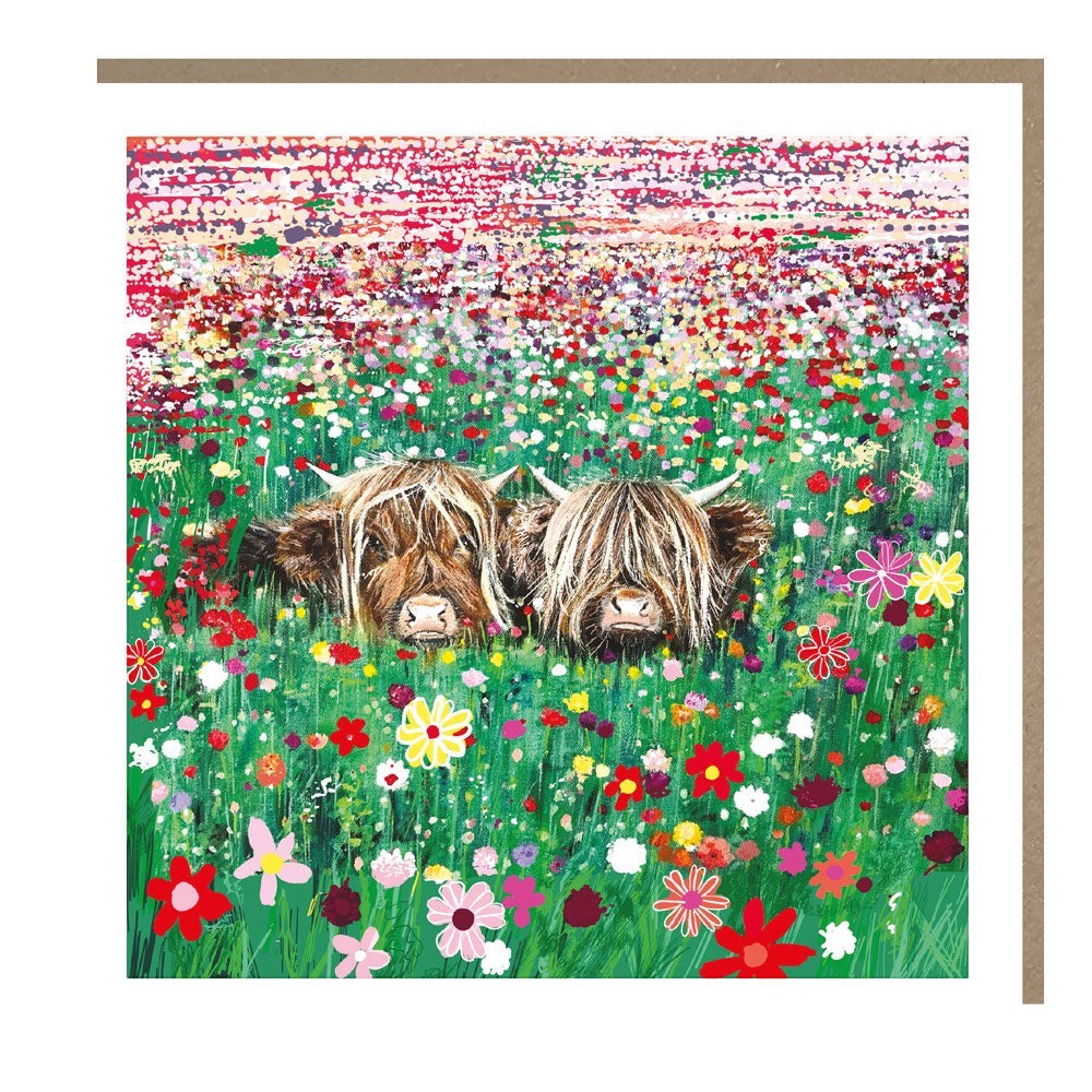 Made To Be Treasured Tracks Publishing blank greeting card featuring two Highland cows in a vibrant wildflower meadow.