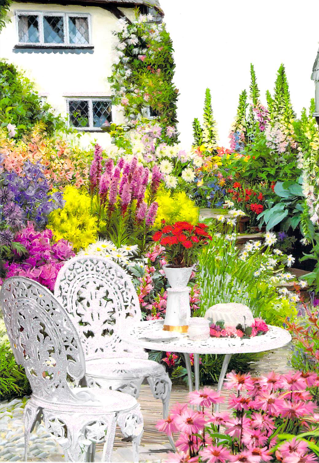 Outdoor scene with patio table & chairs. Lots of flowers and glitter